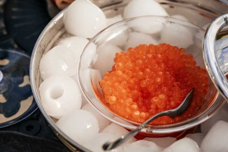 Photo 赤キャビアと美しく提供される朝食用テーブル