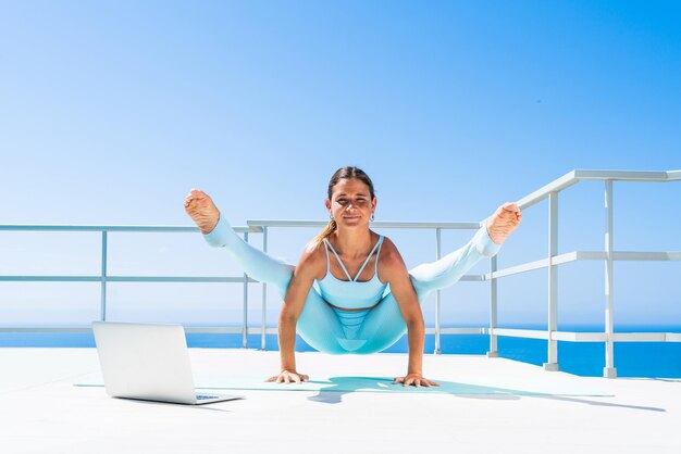 Beautul sportive woman doing yoga exercise