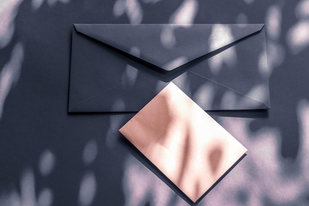 Beauty brand identity as flatlay mockup design business card and letter for online luxury branding on charcoal shadow background