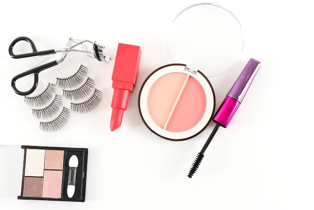 Beauty concept: cosmetic products for makeup