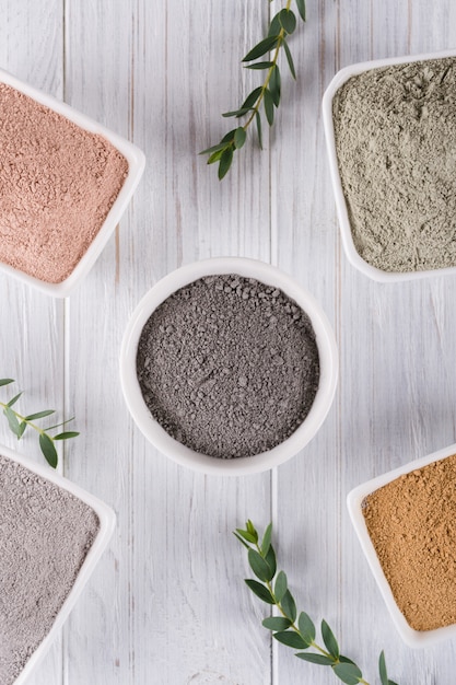 Beauty concept. Flat lay, Different clay mud powders natural ingredients for homemade facial and body mask or scrub