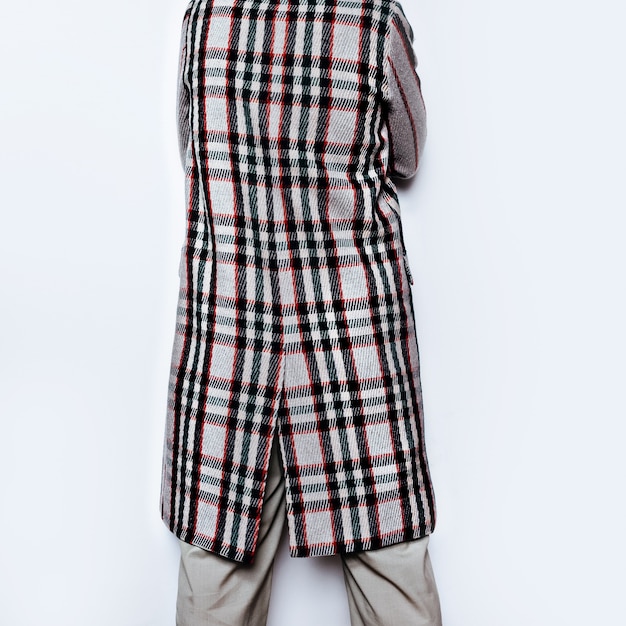 Beauty and fashion concept. Vintage Lady in checkered coat. Checkered Trend Fall Winter