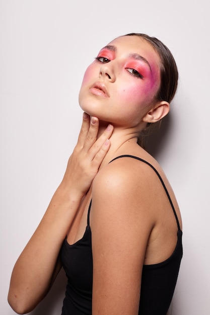 Beauty fashion female pink face makeup posing attractive look isolated background unaltered