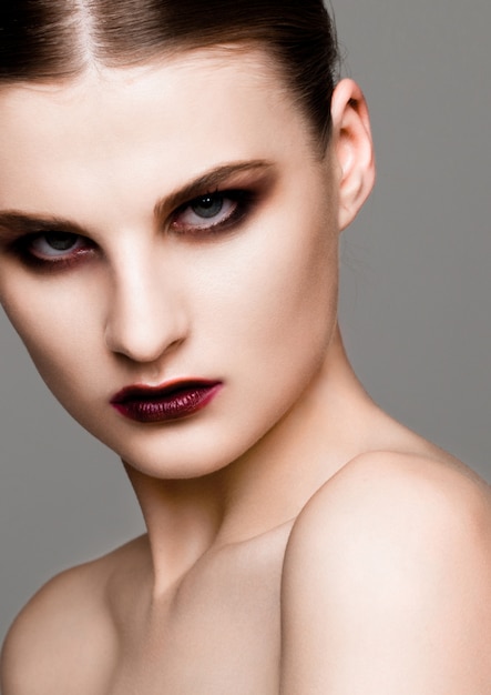 Beauty fashion model with smokey eyes makeup skin care and spa treatment