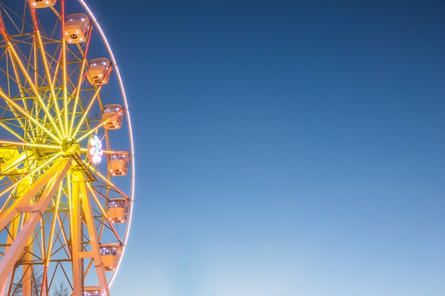 Beauty Ferris wheel against the blue sky