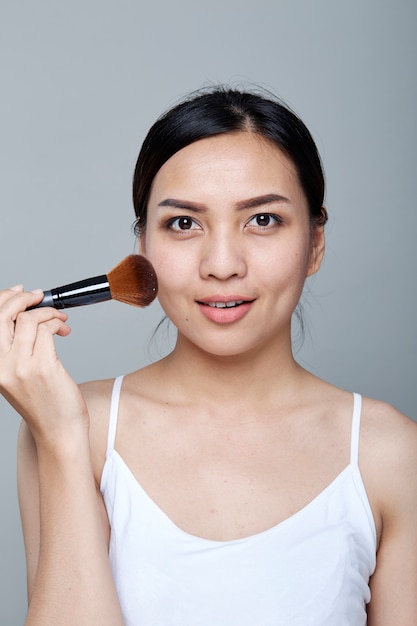 A beauty girl on the grey background