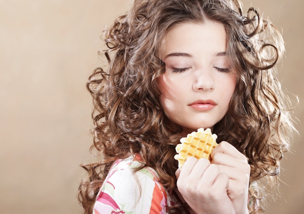 Beauty girl with cookie