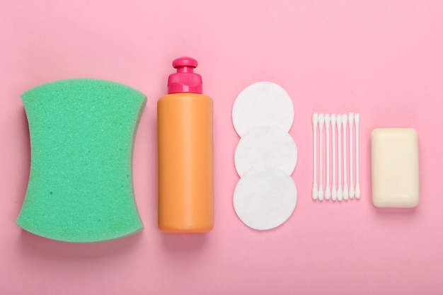 Beauty, health care, bath products and accessories on a pink