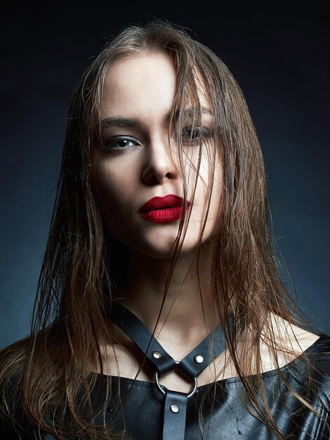 Beauty makeup girl with wet hair and red lips