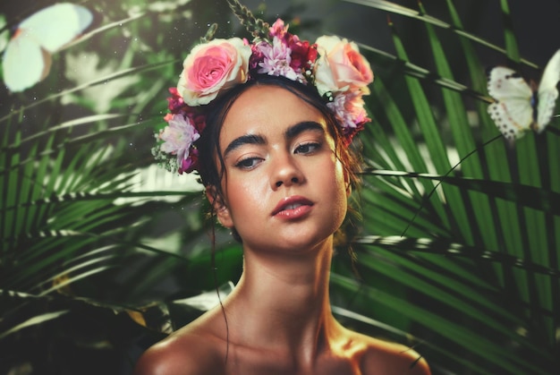 Beauty nature and crown flower on woman in nature jungle for skincare health and wellness with tropical dermatology product cosmetics or makeup Aesthetic spring model with natural floral mockup