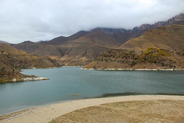 the beauty and peace of lake gizhgit russia pisture of the shore from above copy space for text