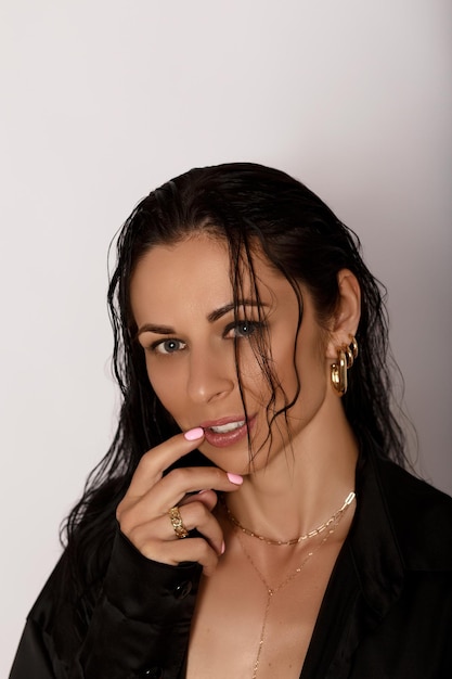 Beauty portrait of an attractive sexy woman with wet hair