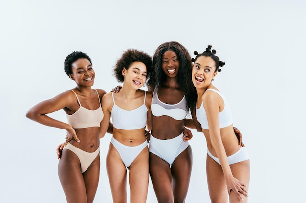 Beauty portrait of beautiful black women wearing lingerie underwear Pretty african young women posing in studio concepts about beauty cosmetology and diversity