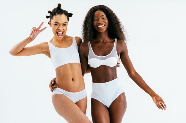 Beauty portrait of beautiful black women wearing lingerie underwear Pretty african young women posing in studio concepts about beauty cosmetology and diversity