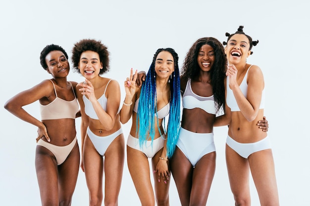 Beauty portrait of beautiful black women wearing lingerie underwear Pretty african young women posing in studio concepts about beauty cosmetology and diversity