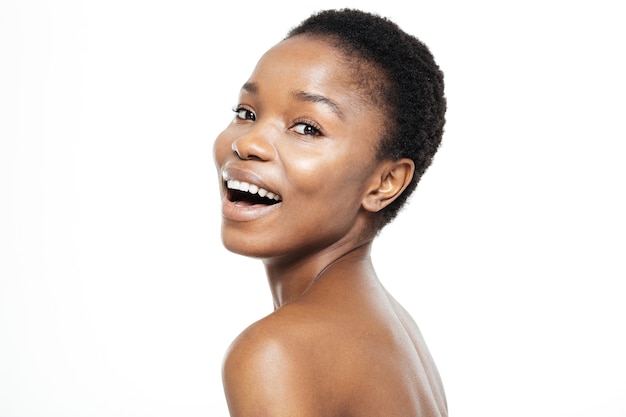 Beauty portrait of a cheerful afro american woman looking at camera isolated on a white background
