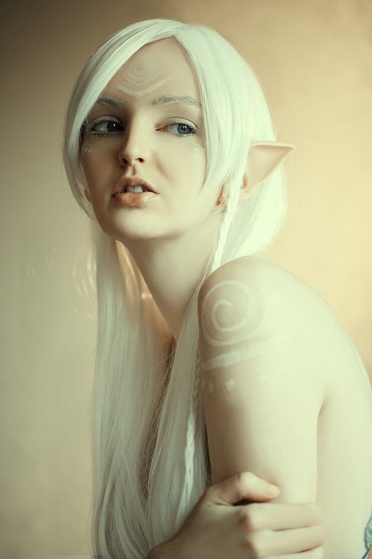 Beauty portrait of girl in fantasy Image of an elf. White hair and faceart. Long Elven ears. Fairy Tail.