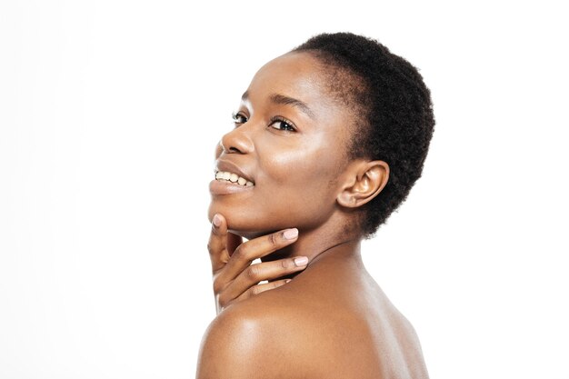 Beauty portrait of a happy afro american woman with fresh skin isolated on a white background