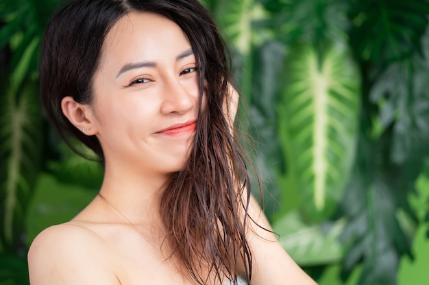 Beauty portrait of young Asian woman with natural background