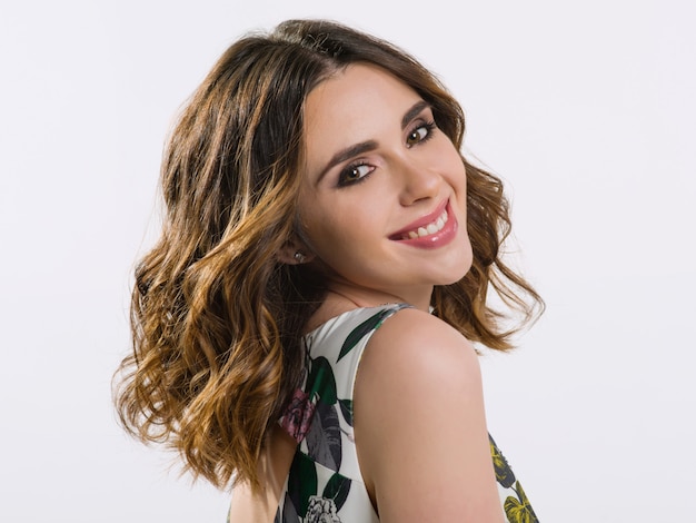 Beauty portrait of a young woman with hairstyle and makeup.