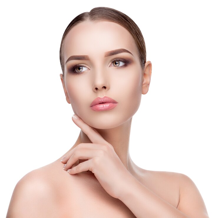 Photo beauty portrait of young woman with perfect clean fresh skin close up isolated on white. skin care concept