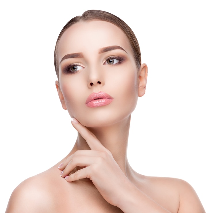 Photo beauty portrait of young woman with perfect clean fresh skin close up isolated on white. skin care concept