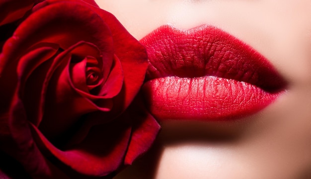 Beauty red lips makeup detail lips with lipstick closeup beautiful woman lips with rose