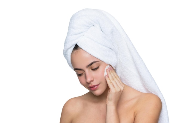 beauty routine woman in towel cleaning face skin cleansing skin with cotton ball skincare cosmetology beauty day in spa woman use cotton pad skincare remove the makeup facial toner