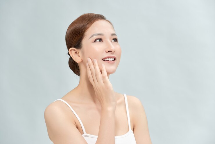 Photo 라이트 블루에 뷰티 스킨 케어 여자
