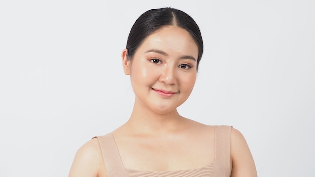 Beauty and skin concept. Young asian woman beauty face make up for skincare cosmetic and showing natural wellness soft and firm and ageless facial skin. 