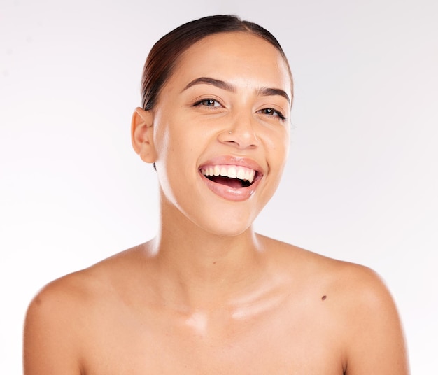 Beauty skincare and smile with portrait of woman for glow luxury and facial product Wellness spa and dermatology with face of girl model for natural self care or clean in white background studio