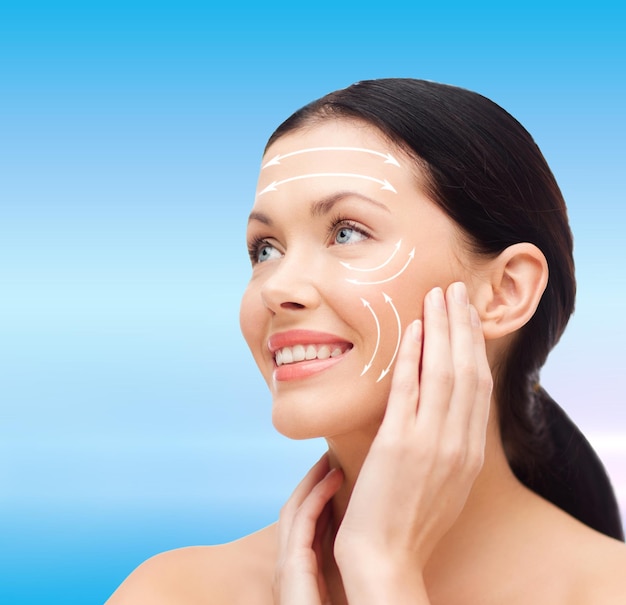 beauty, spa and health concept - smiling young woman