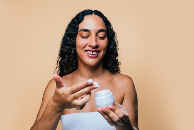 Beauty studio portrait of beautiful hispanic woman with diastema