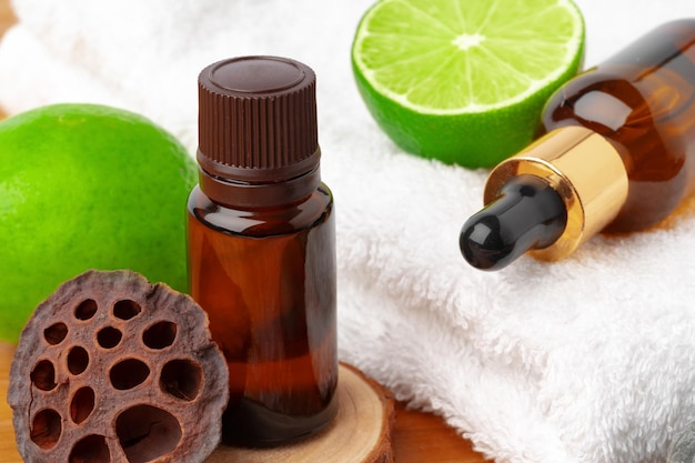 Beauty treatment items for spa procedures on wooden table, close up