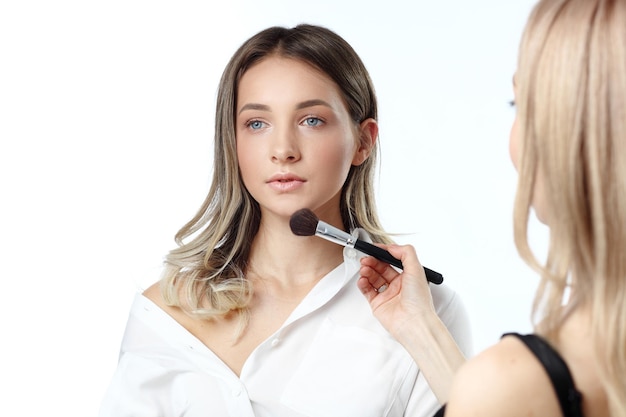 Beauty woman applying makeup