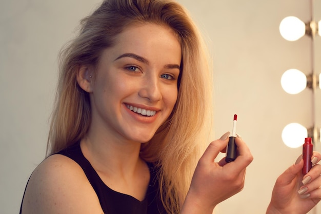 Beauty woman applying makeup