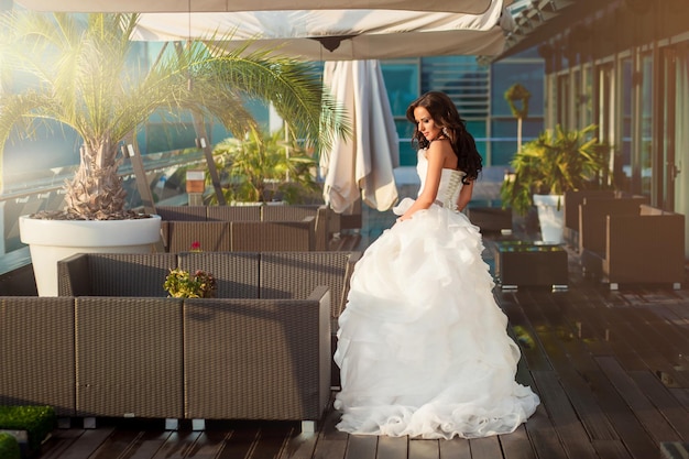 Beauty woman bride in white amazing wedding dress