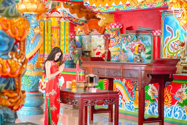 Beauty woman and hold shopping bags in chinese new year