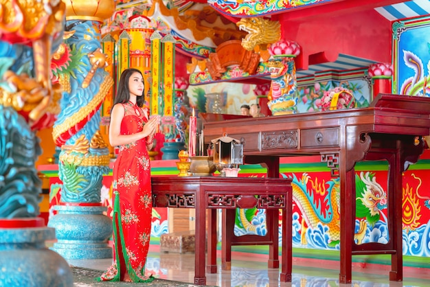 Beauty woman and hold shopping bags in chinese new year