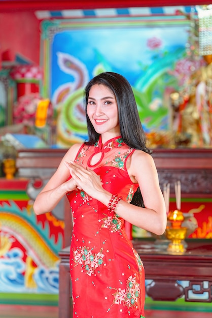 Beauty woman and hold shopping bags in chinese new year