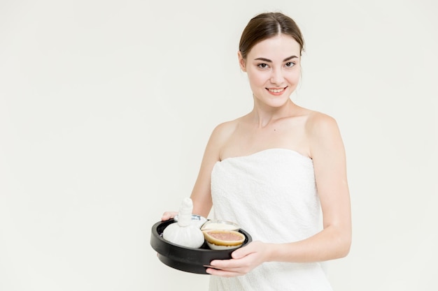 Photo beauty women caucasian model with herbal spa massage cream set isolated on white background