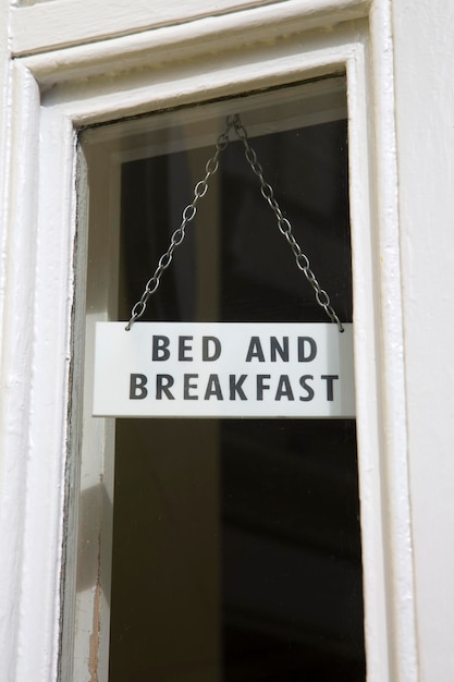 Bed and Breakfast Sign in Window