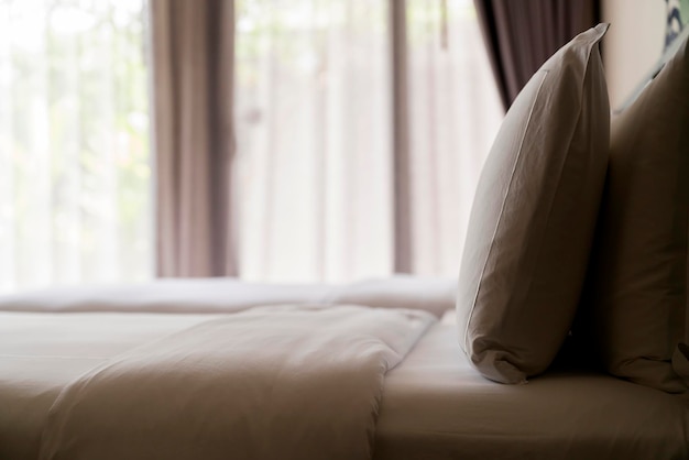 Closeup Of New Bed Comforter With Decorative Pillows Headboard In Bedroom  In Staging Model Home House Or Apartment Stock Photo - Download Image Now -  iStock