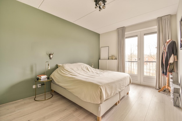 Bed near window in modern apartment