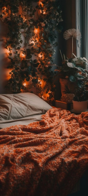 A bed with a red blanket and a plant in the corner