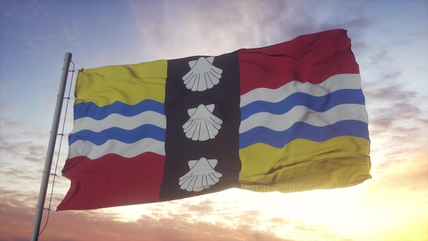 Bedfordshire vlag, engeland, zwaaien in de wind, lucht en zon achtergrond. 3d-rendering.