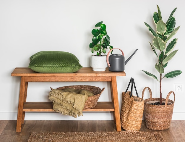 Photo bedroom interior with oak bench pillow blankets homemade flowers and watering can cozy house concept