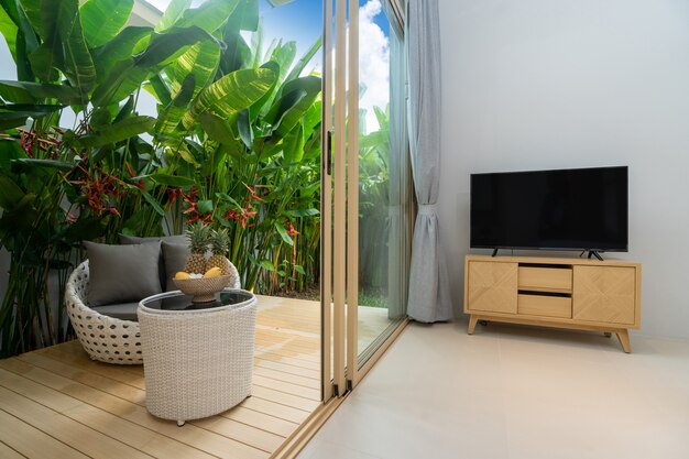 Bedroom with balcony and green garden