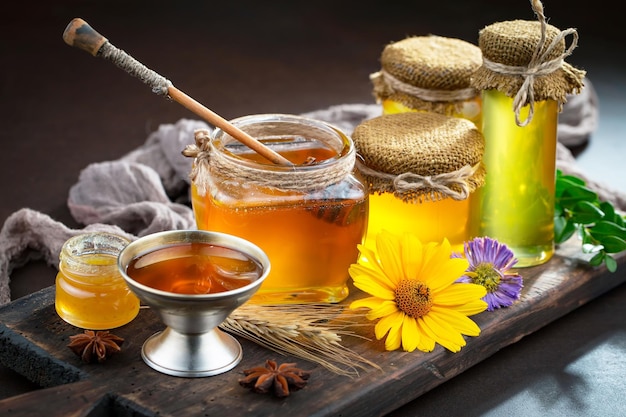 Bee honey in a composition with flowers