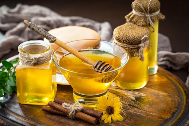 Bee honey in a composition with flowers